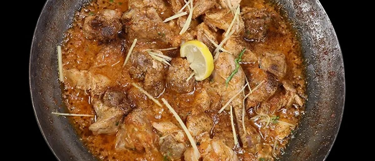 Family-style chicken karahi at Butt Karahi on Winston Churchill Boulevard