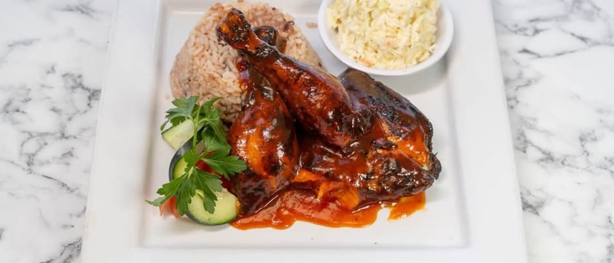 Jerk chicken dinner at Reggae Fusion Caribbean Restaurant in Mississauga